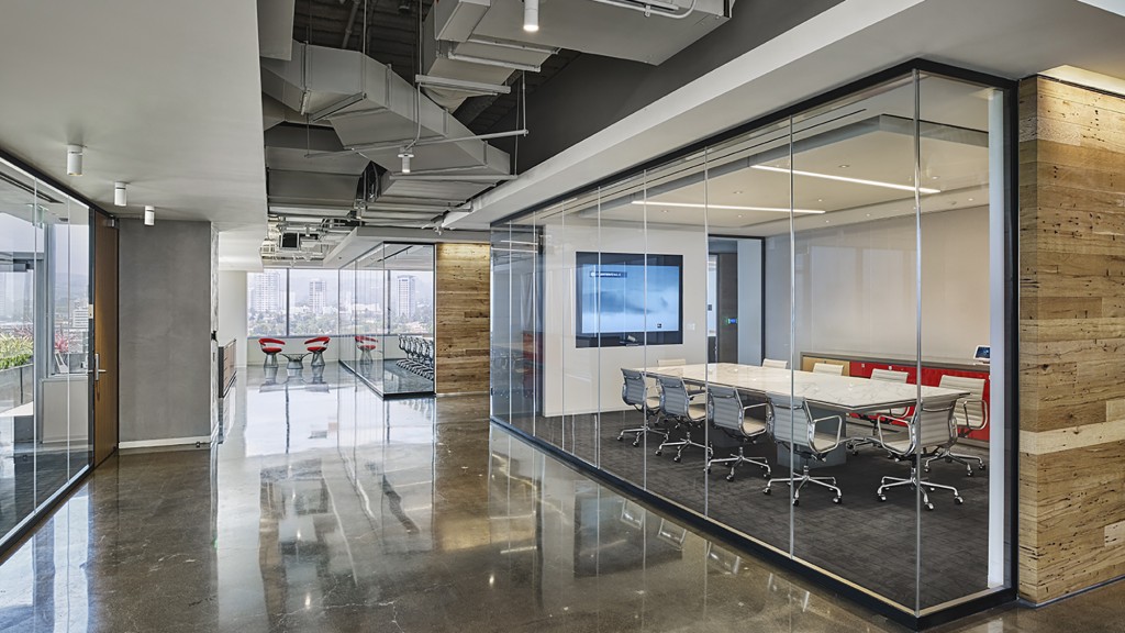 A room with a table and chairs.